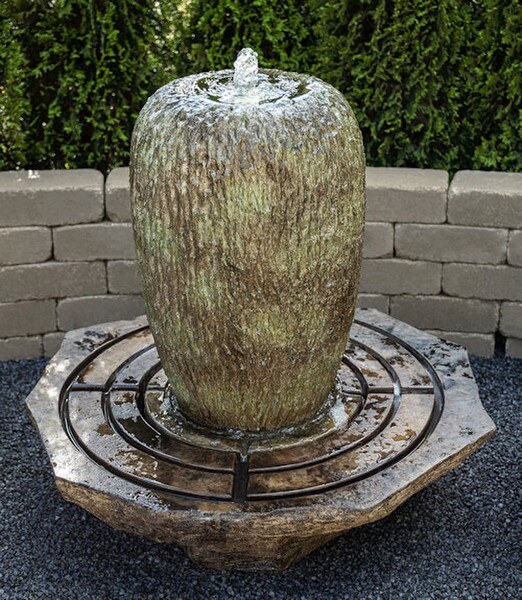 Organic Bowl Tall Fountain with Light water cascades over the roughhewn sides